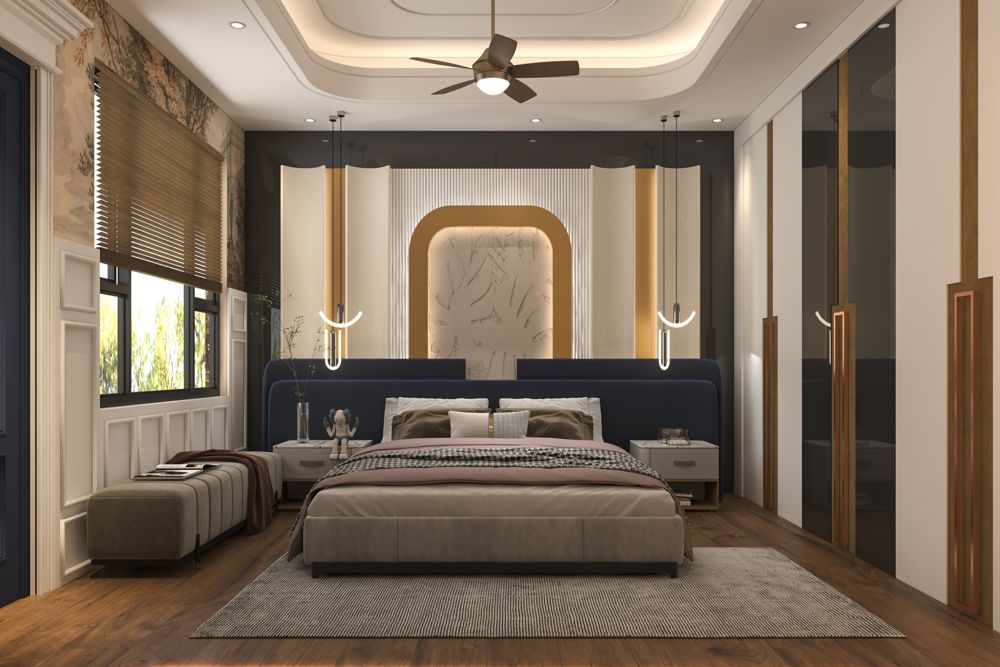 Luminare bedroom with navy headboard and gold arch feature